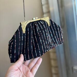 1970s beaded viscose claw close bag